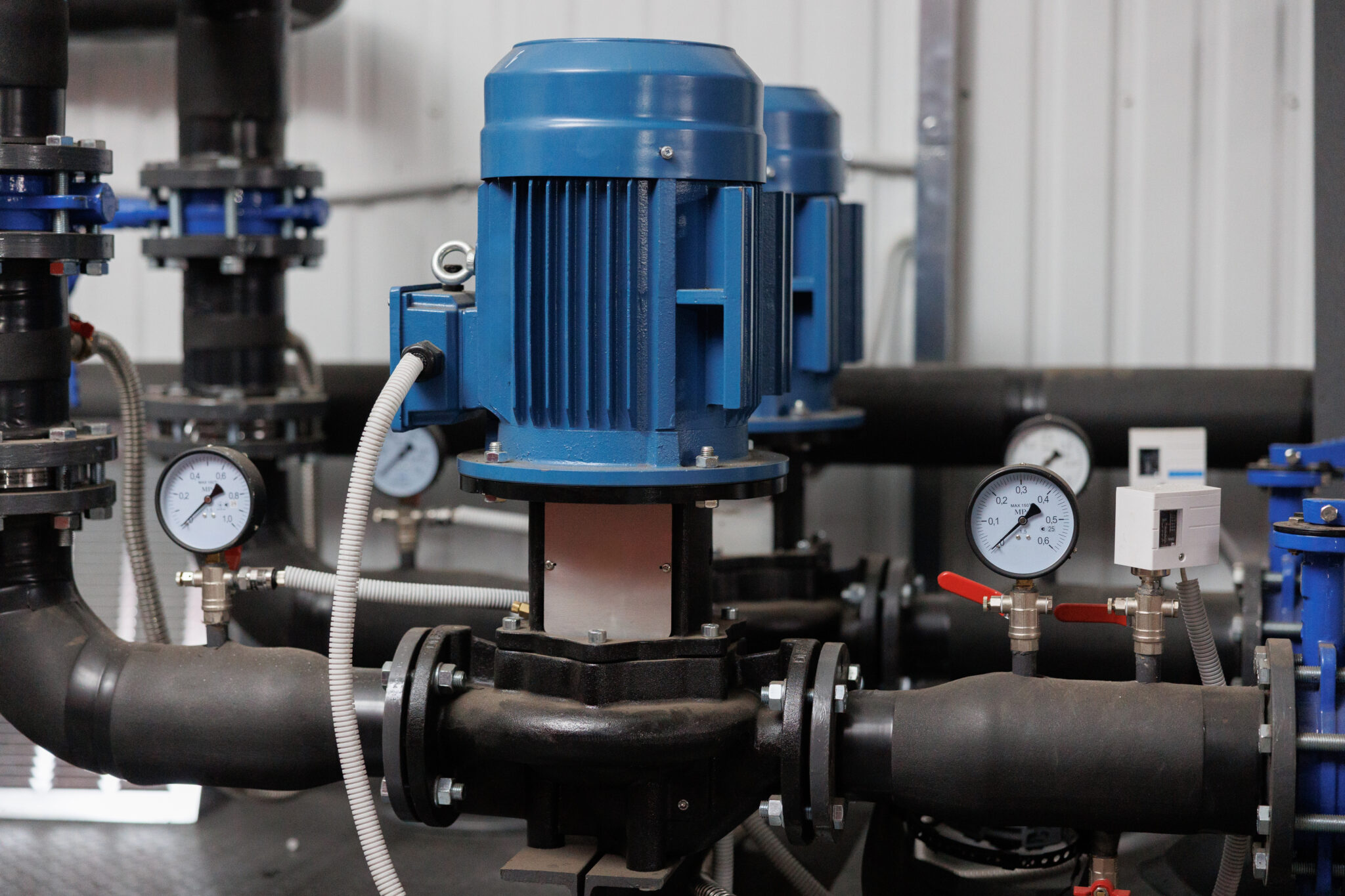 Commercial HVAC circulation pumps with pressure gauges